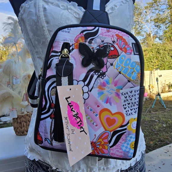Betsey Johnson Handbags - Betsey Johnson Colorful Backpack with Butterfly Accent